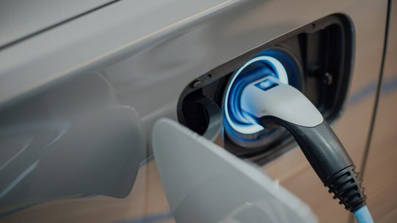 electric vehicle charger plugged into car